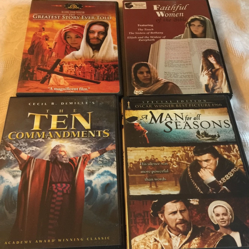4 box set of DVD’s of various titles -1 DVD in each box - pre-owned